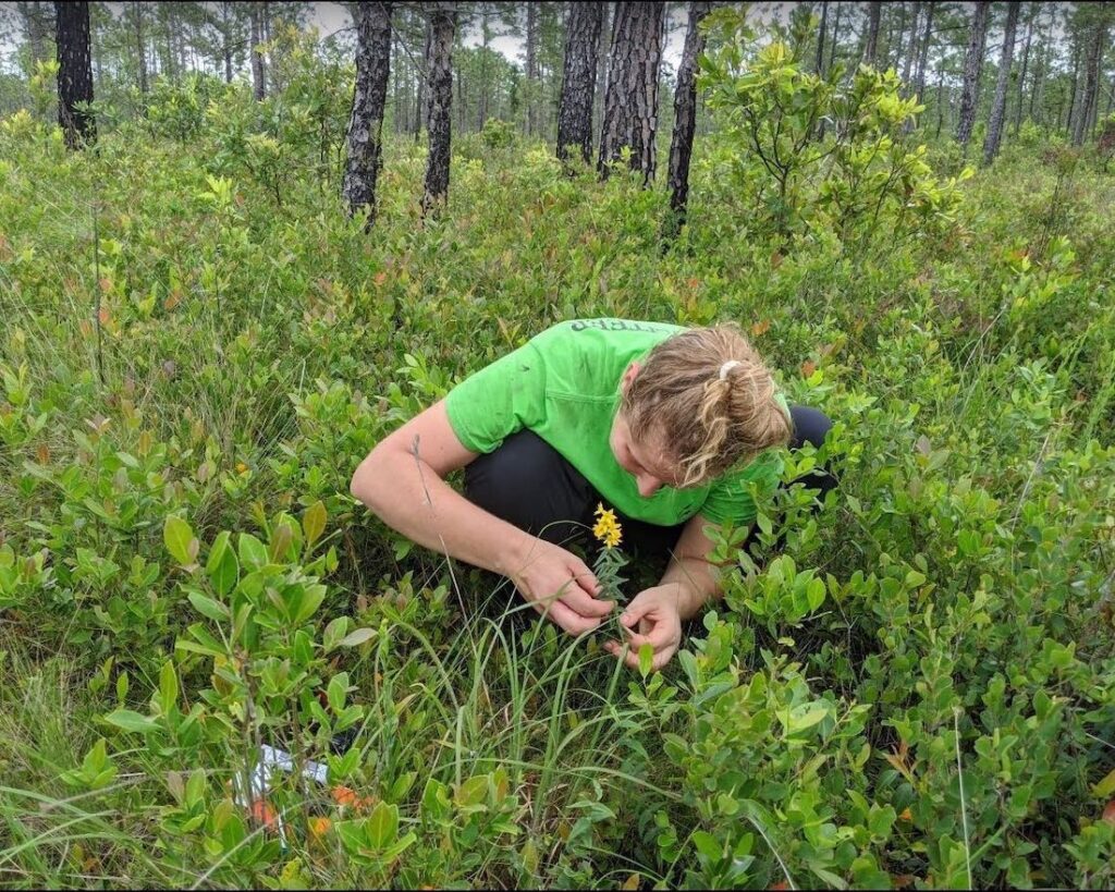 student in field